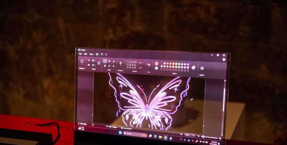 Lenovo's See-Through Laptop Blends Real and Virtual Worlds